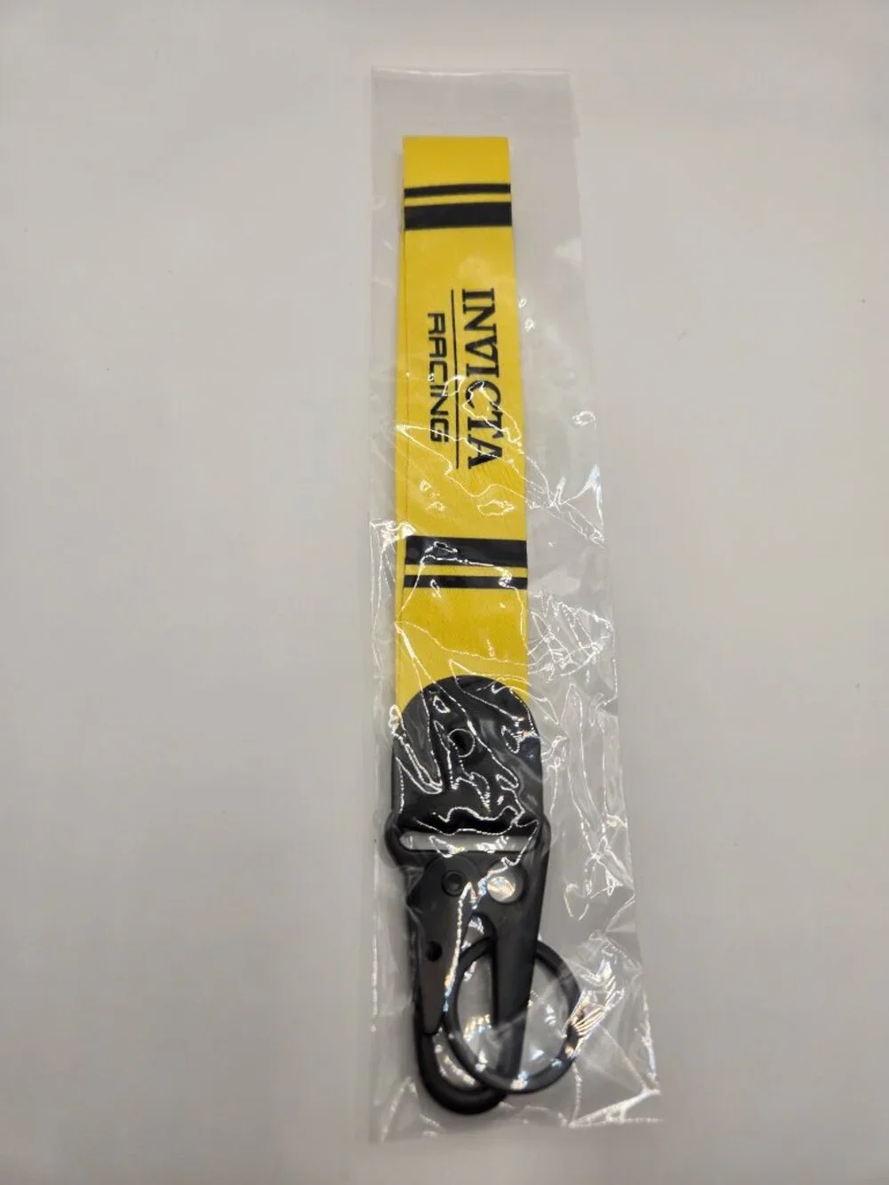 Invicta Racing 1-slot Aluminum Watch Box (IPM645) with Keychain and Lanyard.